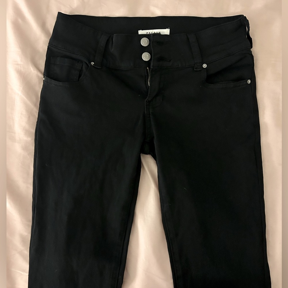 - Low waisted black flared Pacsun jeans -